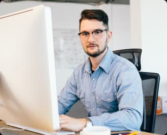 Professional developer working at desk